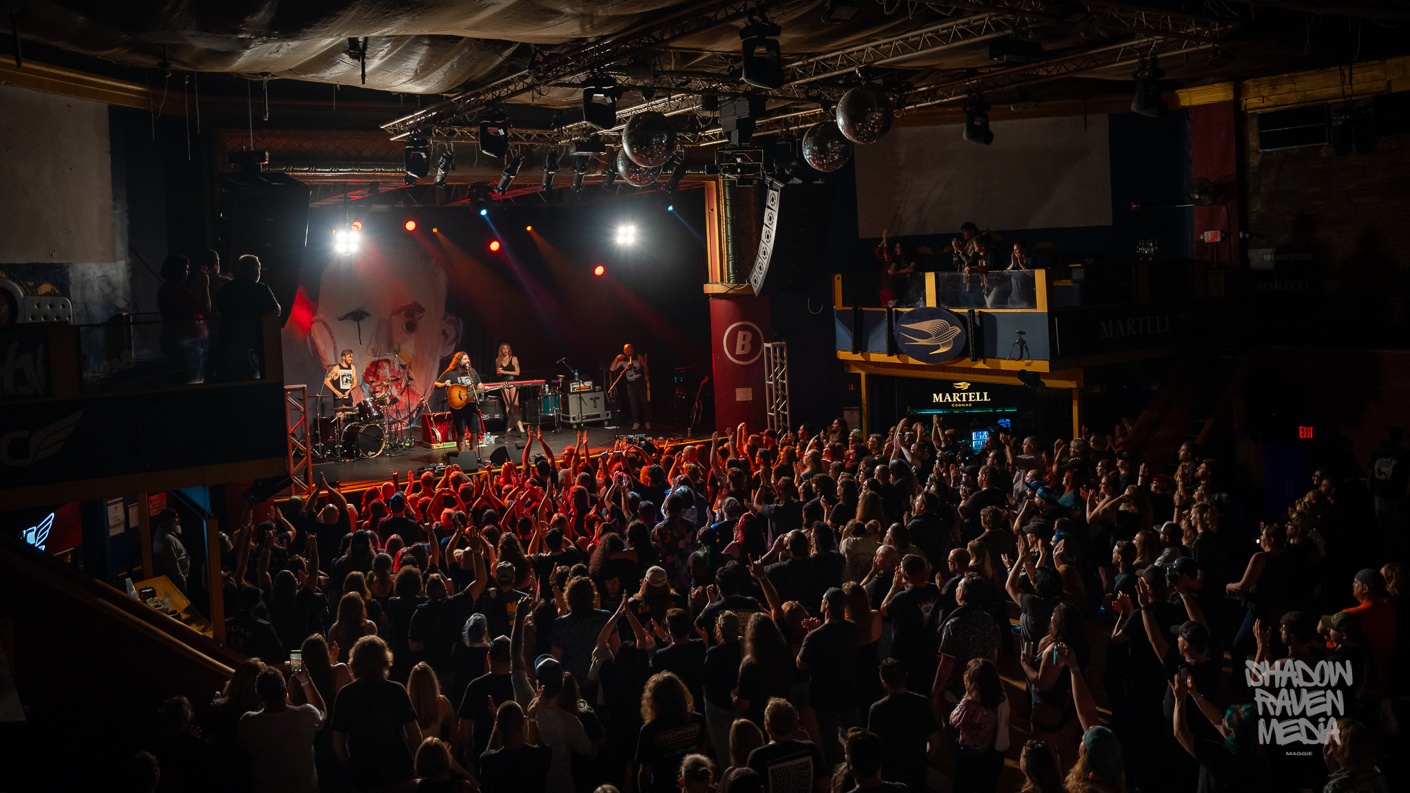 A crowd cheers for Amigo the Devil at The Beacham theater in Orlando Florida